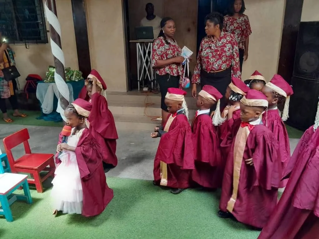 Students sharing a pencil